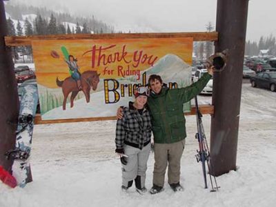 photo of katrina hofstetter and husband skiing