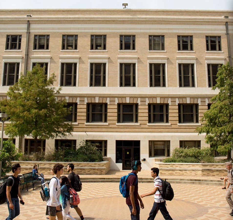 Texas A&amp;M students walking near the Melbern G. Glasscock Building—the home of the Department of History.  Photo courtesy of the TAMU College of Arts and Sciences.