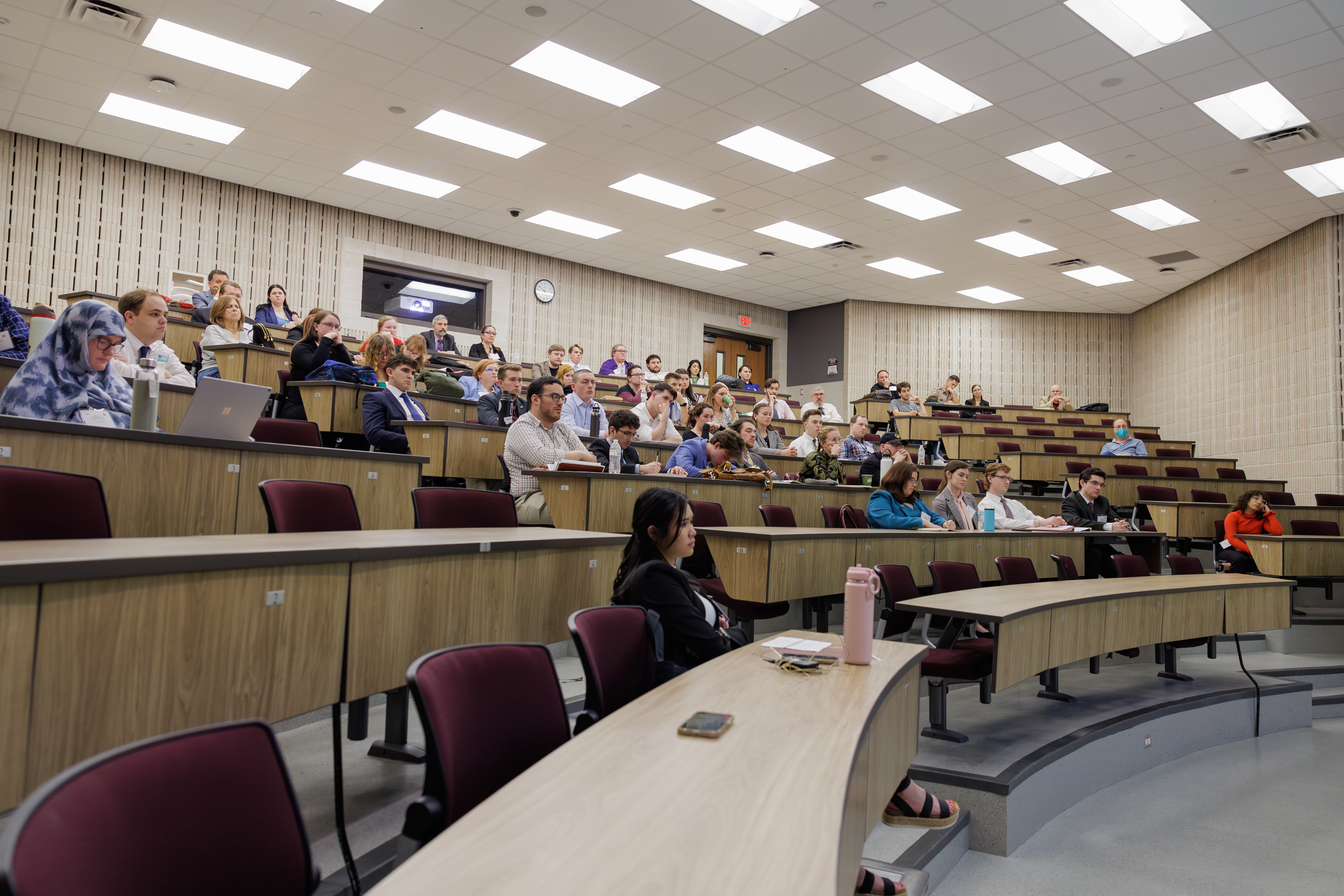History faculty and graduate students from Texas A&amp;M University in a TAMU classroom during the HGSO Conference in 2024.
