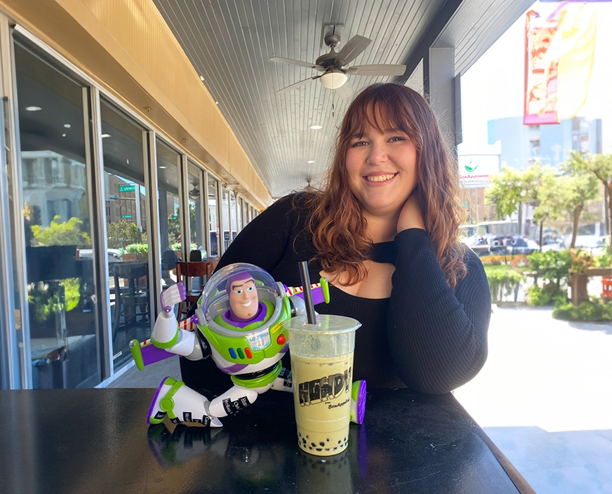 Amber sharing a drink with Buzz