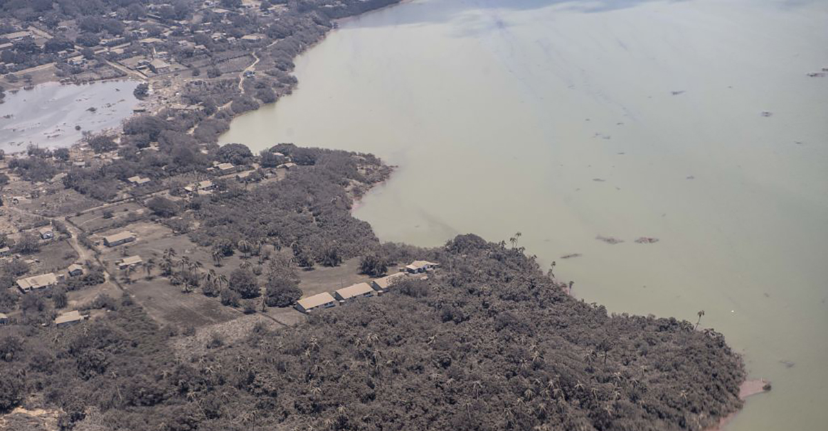 In this handout photo provided by the New Zealand Defense Force, an aerial view from a P-3K2 Orion surveillance flight of homes covered in ash on Jan. 17, 2022 Nomuka, Tonga. 