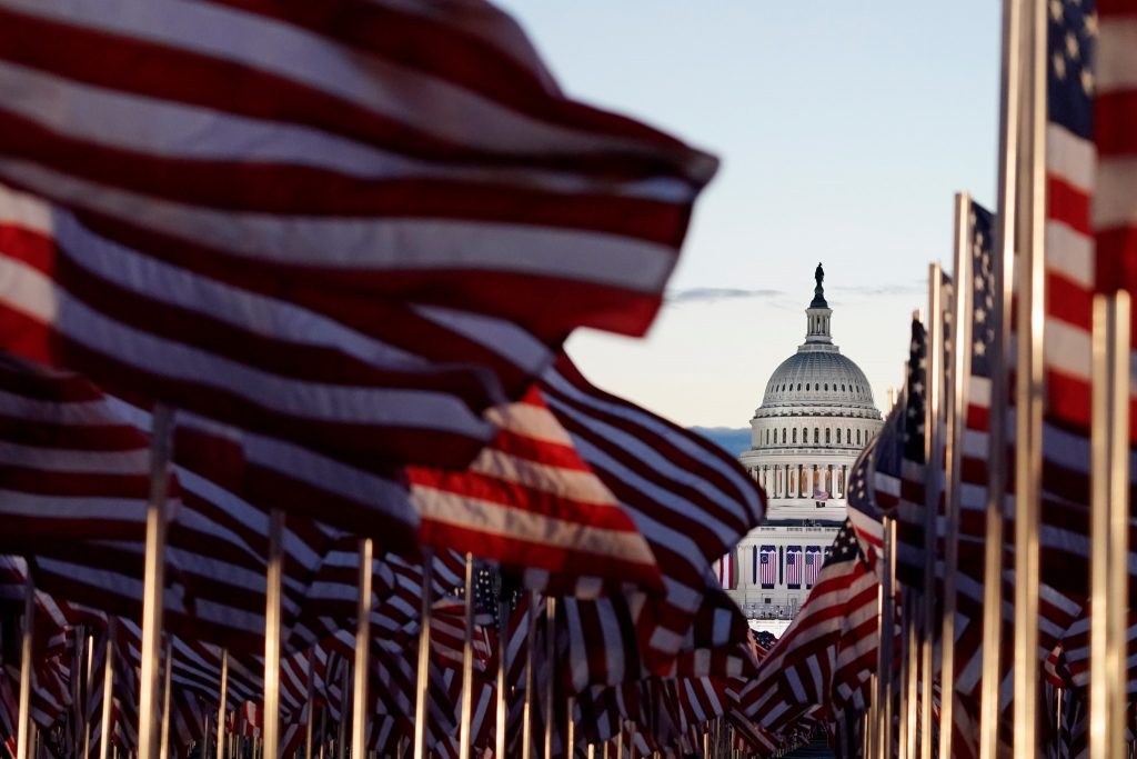 US Embasy behind many American flags 