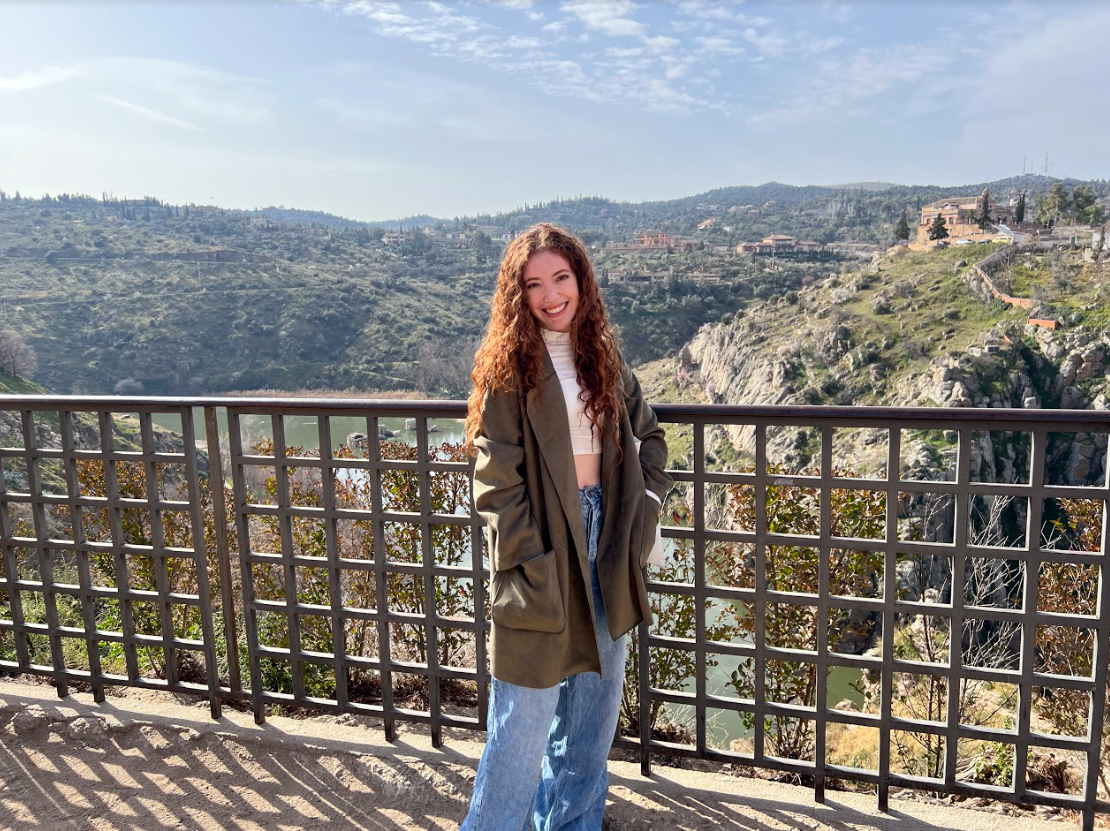 Texas A&M senior Mia Mercer in front of the railway in Toledo, Spain.