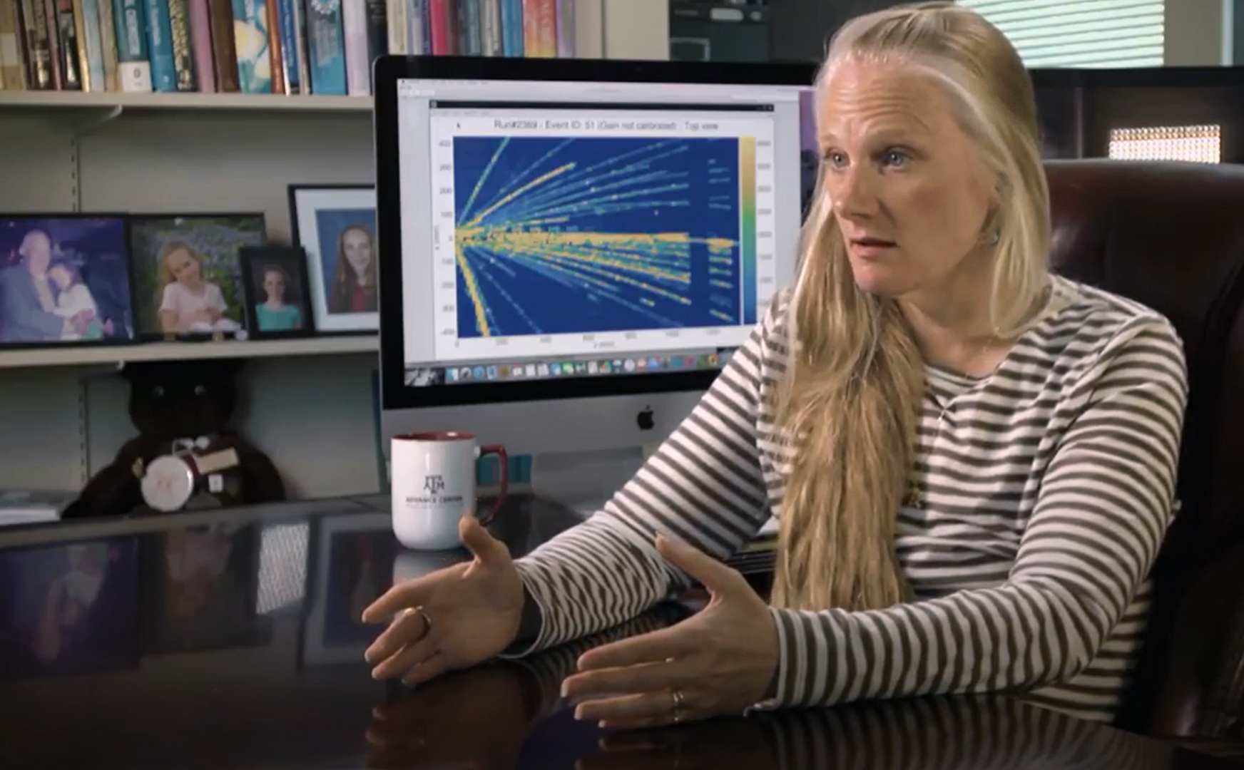 Texas A&amp;M Distinguished Professor and Regents Professor of Chemistry Dr. Sherry Yennello explains her research from her office within the Texas A&amp;M Cyclotron Institute