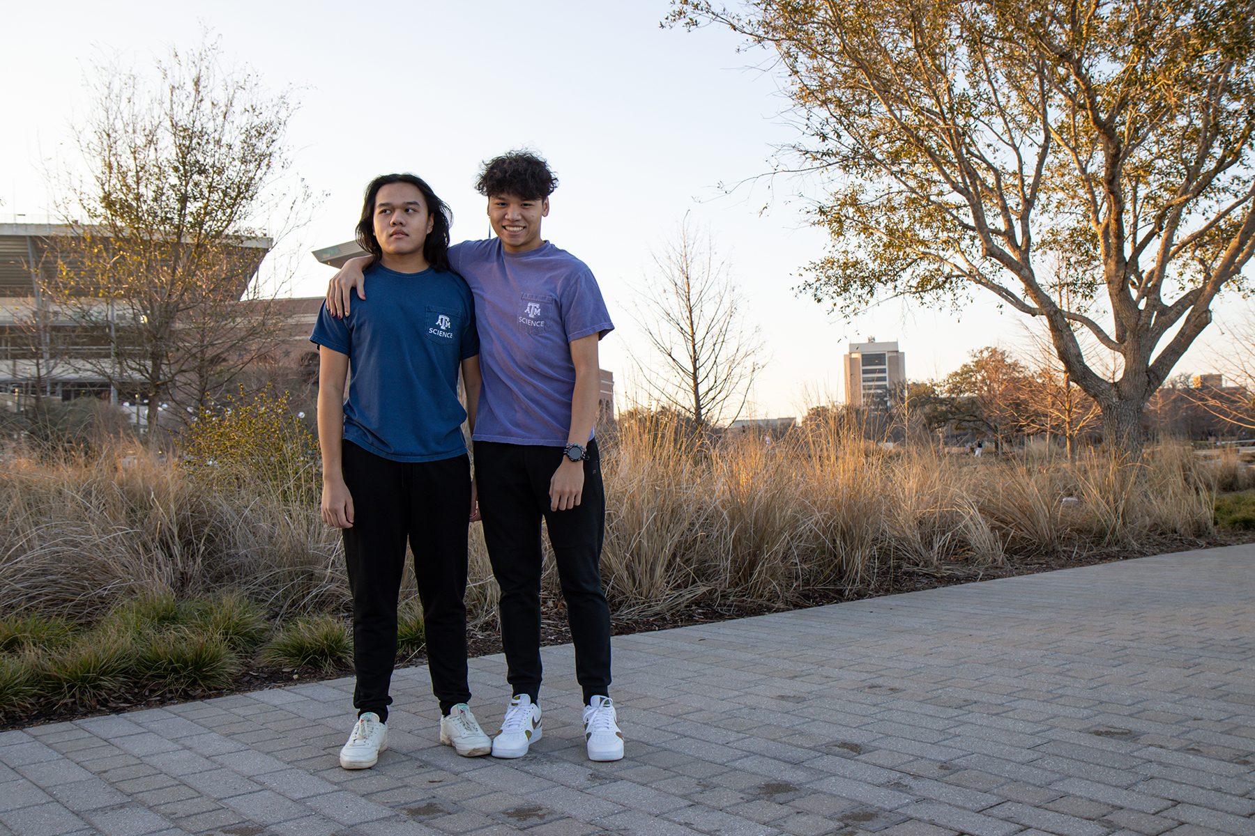 Texas A&amp;M biology majors and brothers Henry and Kyle Nguyen in Aggie Park on the Texas A&amp;M campus