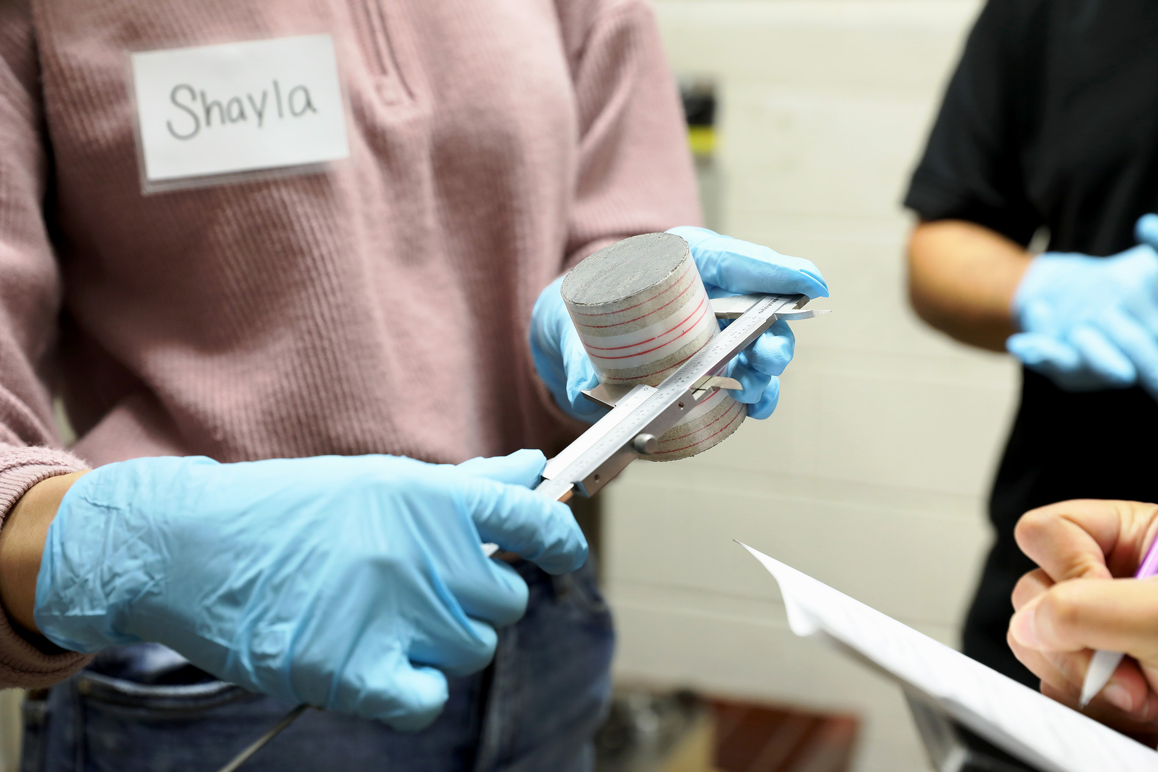 Students measure and test their rock samples during the inaugural Texas A&amp;M Geology and Geophysics Rock Deformation Summer School in August 2022