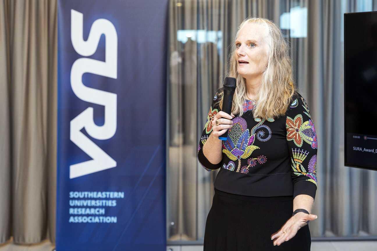 Texas A&amp;M chemist Sherry Yennello presents her research to a Southeastern Universities Research Association audience in August 2023.