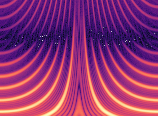 Illustration of a nuclear frequency comb displaying single photons as visualized on a logarithmic scale from dark to bright colors, with brighter colors indicating instances of time where the stored photons have a higher probability of being retrieved