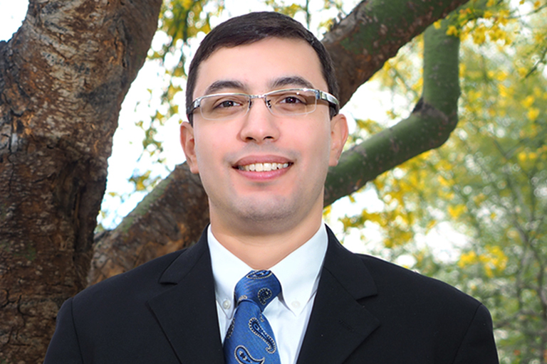 Outdoor headshot of Carlos Cantu