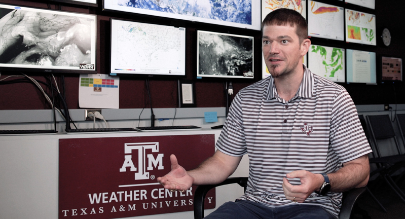 Texas A&M University atmospheric scientist Eric Nielsen, being interviewed in the Texas A&M Weather Center in the Department of Atmospheric Sciences